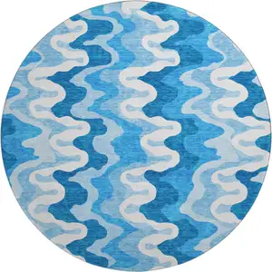 Photo of 8' Sky Blue And Ivory Abstract Washable Round Rug With UV Protection