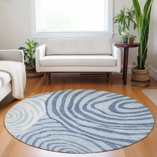 8' Sky Blue And Ivory Abstract Washable Round Rug With UV Protection Photo 4