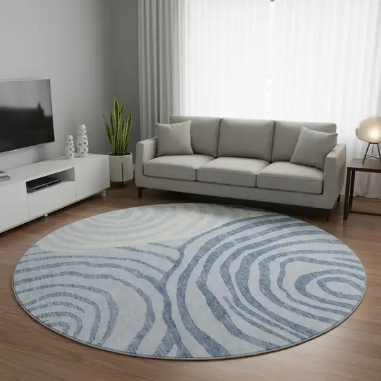 8' Sky Blue And Ivory Abstract Washable Round Rug With UV Protection Photo 2