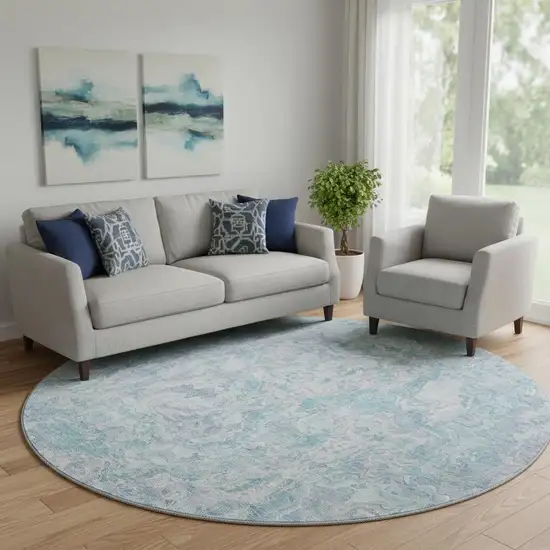8' Sky Blue And Ivory Abstract Washable Round Rug With UV Protection Photo 1