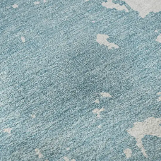 8' Sky Blue And Ivory Abstract Washable Round Rug With UV Protection Photo 9