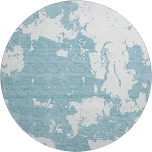 Photo of 8' Sky Blue And Ivory Abstract Washable Round Rug With UV Protection