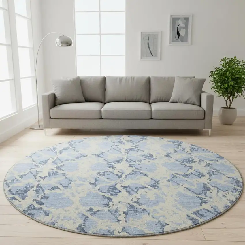 8' Sky Blue And Ivory Abstract Washable Round Rug With UV Protection Photo 2