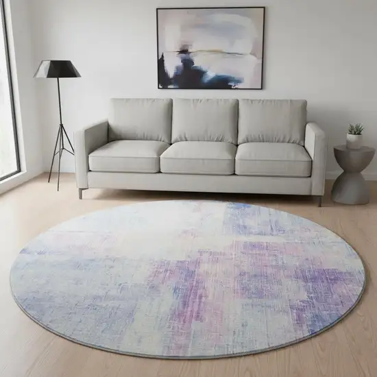 8' Sky Blue And Ivory Abstract Washable Round Rug With UV Protection Photo 2