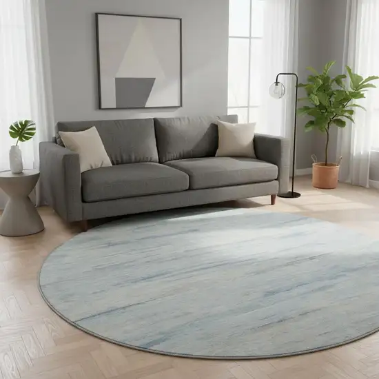 8' Sky Blue And Ivory Abstract Washable Round Rug With UV Protection Photo 2