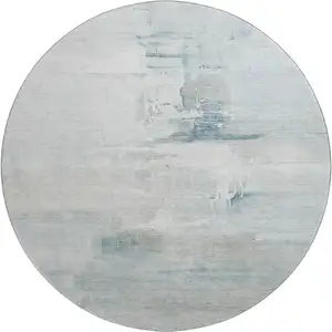 Photo of 8' Sky Blue And Ivory Abstract Washable Round Rug With UV Protection