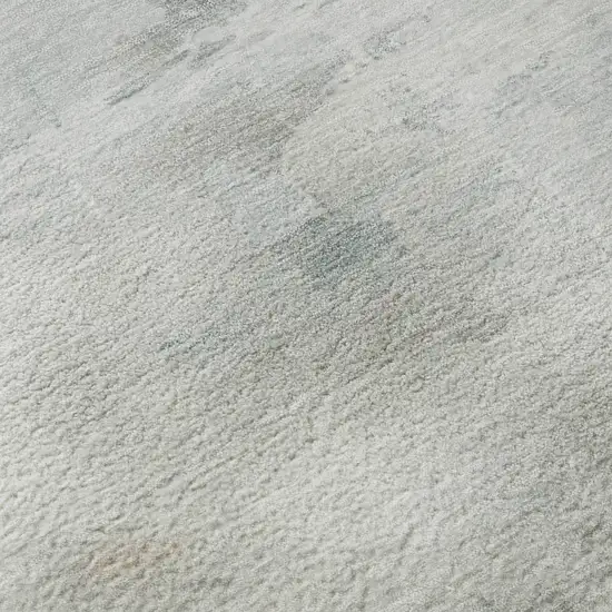 8' Sky Blue And Ivory Abstract Washable Round Rug With UV Protection Photo 8