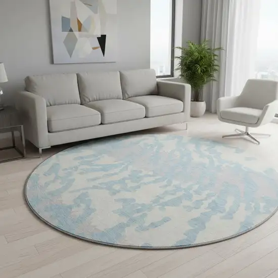 8' Sky Blue And Ivory Animal Print Washable Round Rug With UV Protection Photo 2