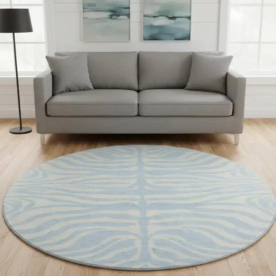 8' Sky Blue And Ivory Animal Print Washable Round Rug With UV Protection Photo 2