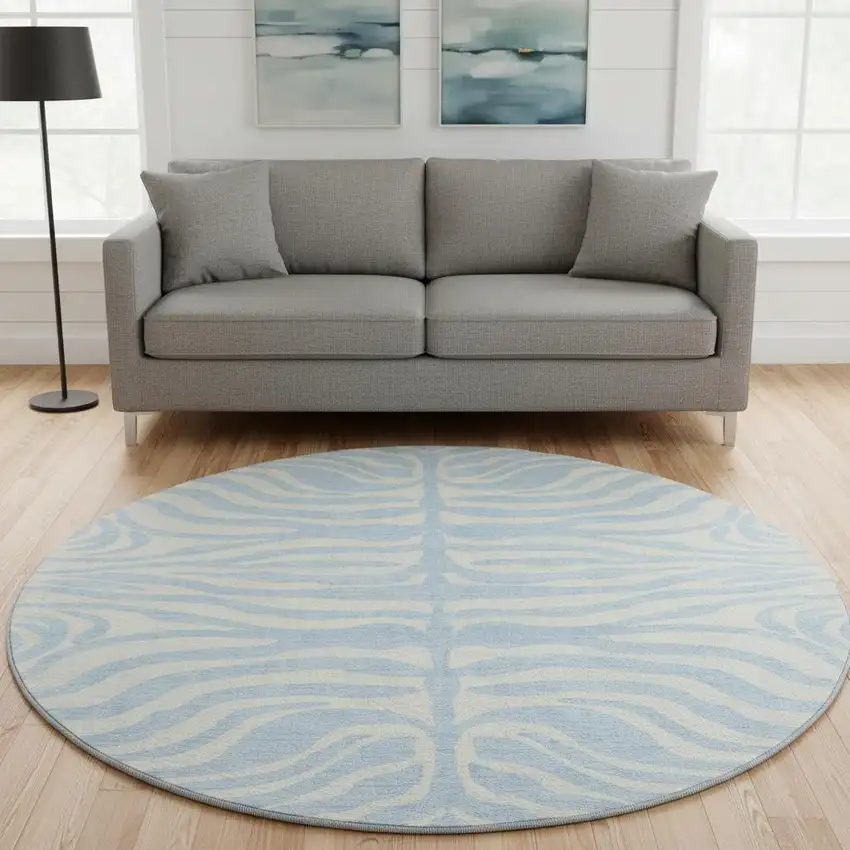 8' Sky Blue And Ivory Animal Print Washable Round Rug With UV Protection Photo 2