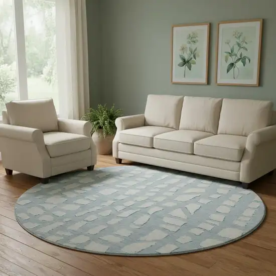 8' Sky Blue And Ivory Cobblestone Washable Round Rug With UV Protection Photo 1