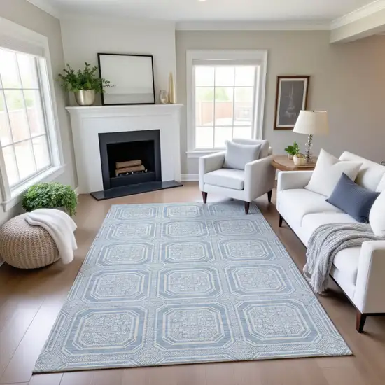 8' Sky Blue And Ivory Geometric Washable Area Rug With UV Protection Photo 3