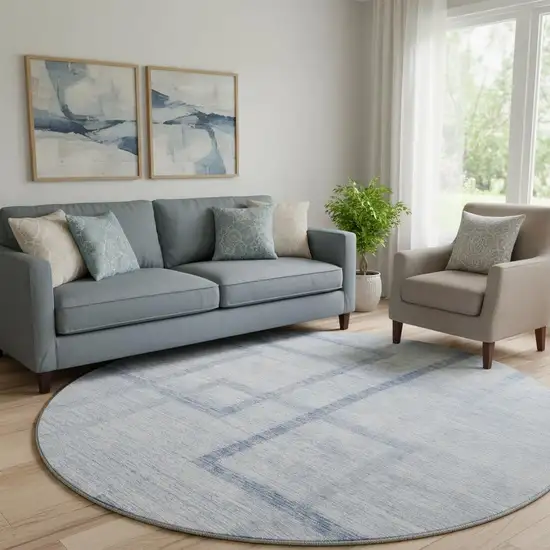 8' Sky Blue And Ivory Geometric Washable Round Rug With UV Protection Photo 1
