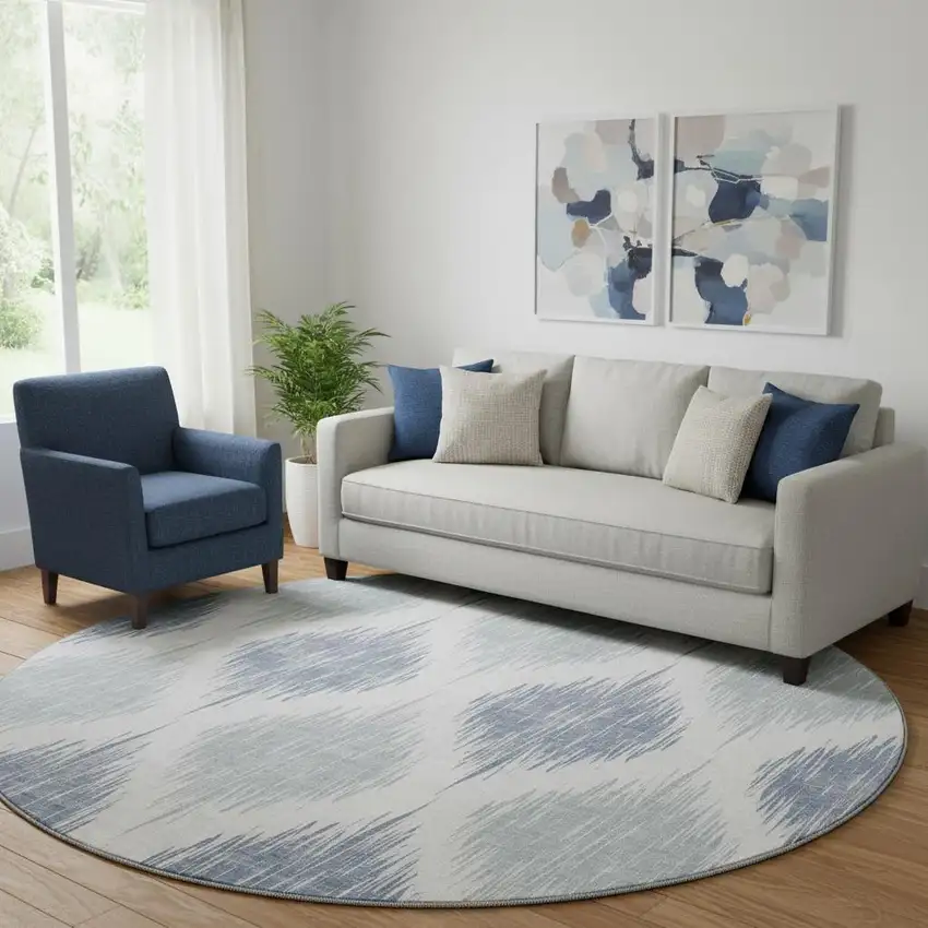 8' Sky Blue And Ivory Ikat Washable Round Rug With UV Protection Photo 1