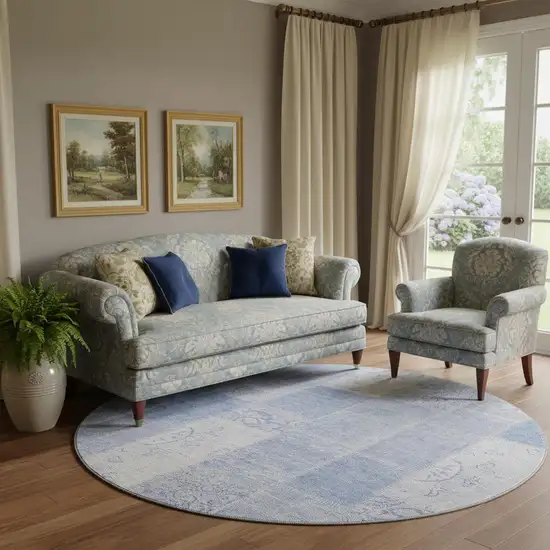 8' Sky Blue And Ivory Patchwork Washable Round Rug With UV Protection Photo 1