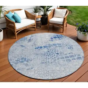 Photo of 8' Sky Blue And Ivory Round Abstract Washable Indoor Outdoor Area Rug