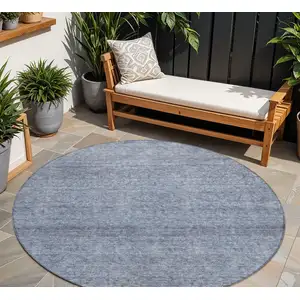 Photo of 8' Sky Blue And Ivory Round Abstract Washable Indoor Outdoor Area Rug
