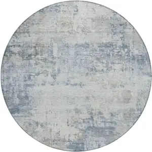 Photo of 8' Sky Blue And Ivory Round Abstract Washable Indoor Outdoor Area Rug