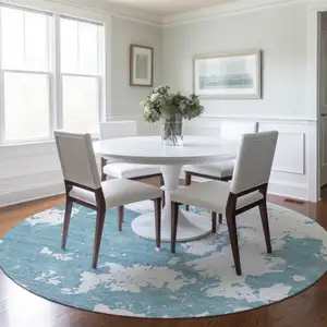 Photo of 8' Sky Blue And Ivory Round Abstract Washable Indoor Outdoor Area Rug