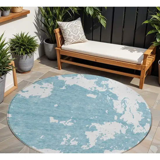 8' Sky Blue And Ivory Round Abstract Washable Indoor Outdoor Area Rug Photo 1