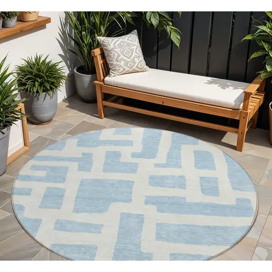 8' Sky Blue And Ivory Round Abstract Washable Indoor Outdoor Area Rug Photo 1