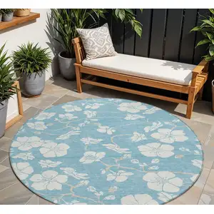 Photo of 8' Sky Blue And Ivory Round Floral Washable Indoor Outdoor Area Rug