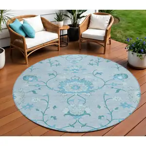 Photo of 8' Sky Blue And Ivory Round Floral Washable Indoor Outdoor Area Rug