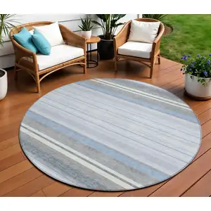 Photo of 8' Sky Blue And Ivory Round Striped Washable Indoor Outdoor Area Rug