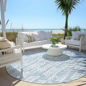 Photo of 8' Sky Blue And Ivory Round Tribal Washable Indoor Outdoor Area Rug