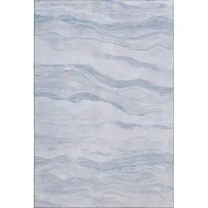 Photo of 8' Sky Blue And Ivory Striped Washable Area Rug With UV Protection