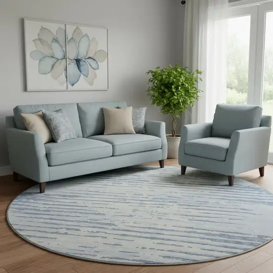 8' Sky Blue And Ivory Striped Washable Round Rug With UV Protection Photo 1