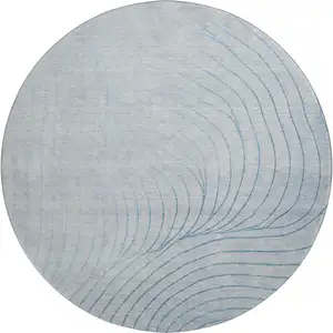 Photo of 8' Sky Blue And Silver Abstract Washable Round Rug With UV Protection