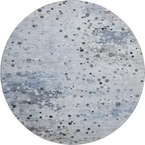 Photo of 8' Sky Blue Charcoal And Ivory Abstract Washable Round Rug With UV Protection
