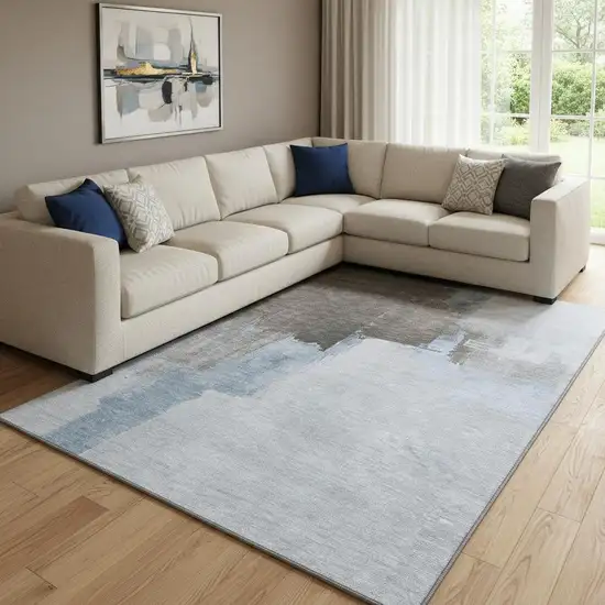 8' Sky Blue Chocolate And Taupe Abstract Washable Area Rug With UV Protection Photo 2