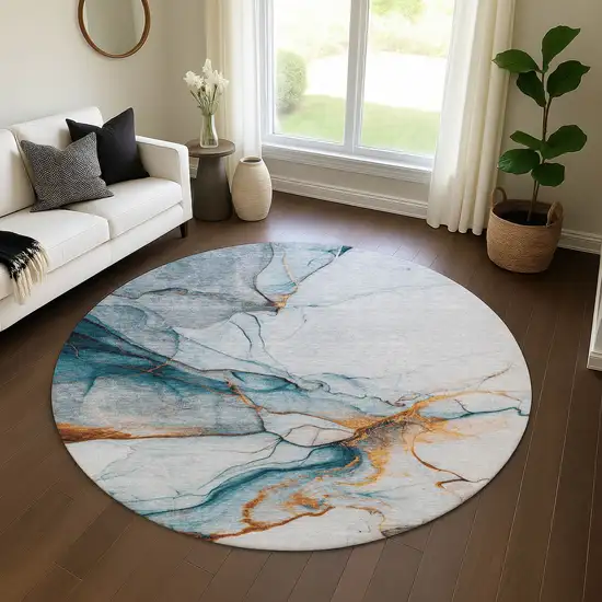 8' Sky Blue Copper And Ivory Abstract Washable Round Rug With UV Protection Photo 4