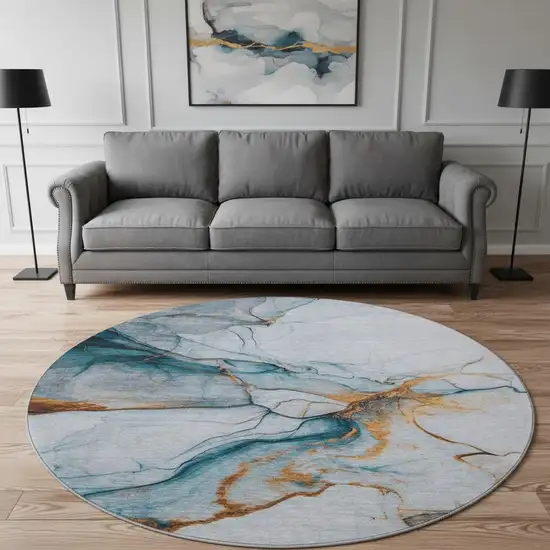 8' Sky Blue Copper And Ivory Abstract Washable Round Rug With UV Protection Photo 2