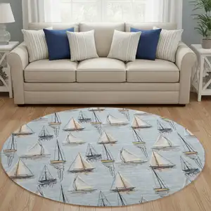 Photo of 8' Sky Blue Gold And Ivory Nautical Washable Round Rug With UV Protection