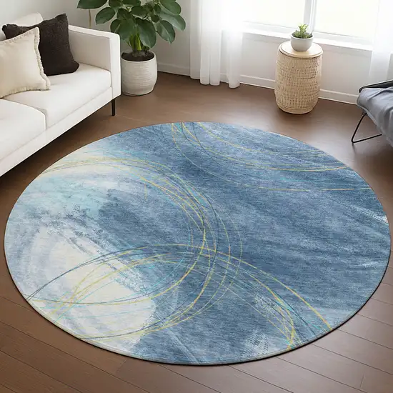 8' Sky Blue Gold And Ivory Round Abstract Washable Indoor Outdoor Area Rug Photo 5