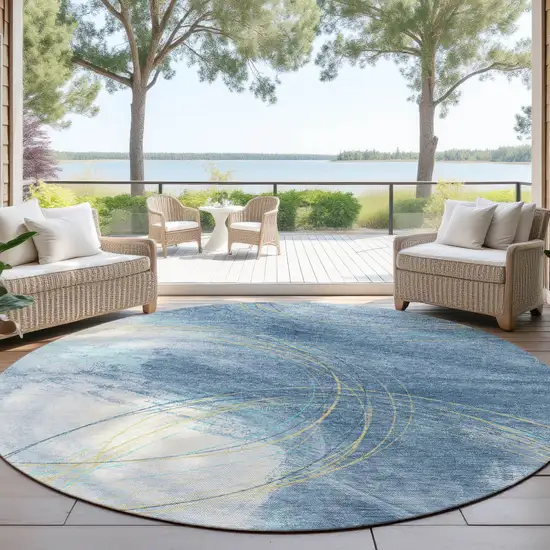 8' Sky Blue Gold And Ivory Round Abstract Washable Indoor Outdoor Area Rug Photo 4