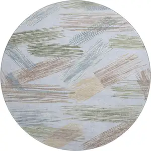 Photo of 8' Sky Blue Gold And Taupe Striped Washable Round Rug With UV Protection