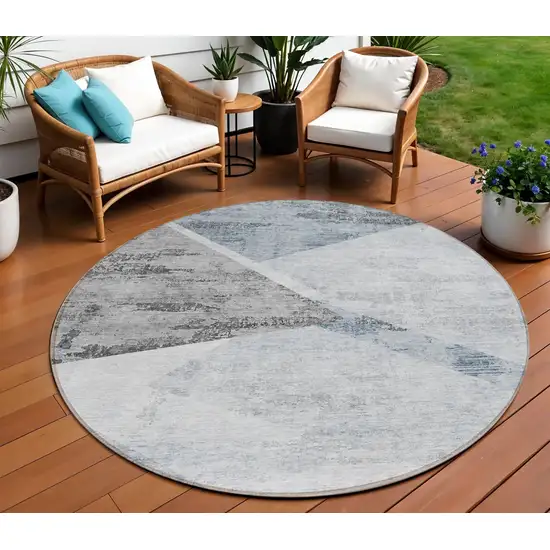 8' Sky Blue Gray And Charcoal Round Abstract Washable Indoor Outdoor Area Rug Photo 1