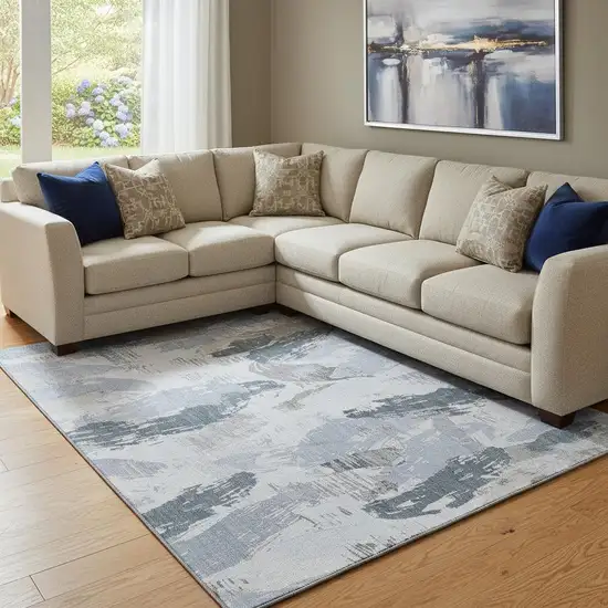 8' Sky Blue Gray And Ivory Abstract Washable Area Rug With UV Protection Photo 2