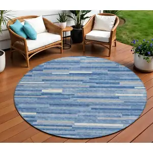 Photo of 8' Sky Blue Gray And Ivory Round Striped Washable Indoor Outdoor Area Rug