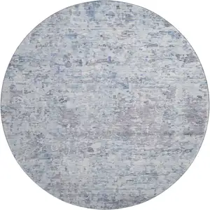 Photo of 8' Sky Blue Gray And Silver Abstract Washable Round Rug With UV Protection