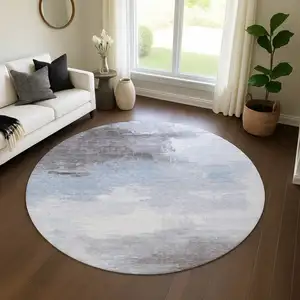 Photo of 8' Sky Blue Gray And Silver Abstract Washable Round Rug With UV Protection