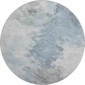 Photo of 8' Sky Blue Gray And Silver Abstract Washable Round Rug With UV Protection