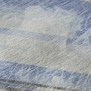 Photo of 8' Sky Blue Gray And Silver Striped Washable Area Rug With UV Protection