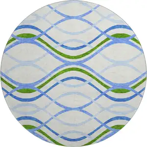 Photo of 8' Sky Blue Green And Ivory Abstract Washable Round Rug With UV Protection