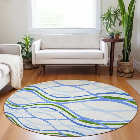 8' Sky Blue Green And Ivory Abstract Washable Round Rug With UV Protection Photo 5