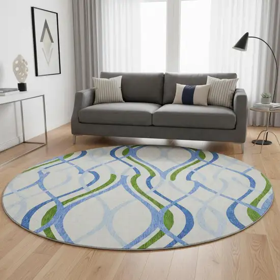8' Sky Blue Green And Ivory Abstract Washable Round Rug With UV Protection Photo 2